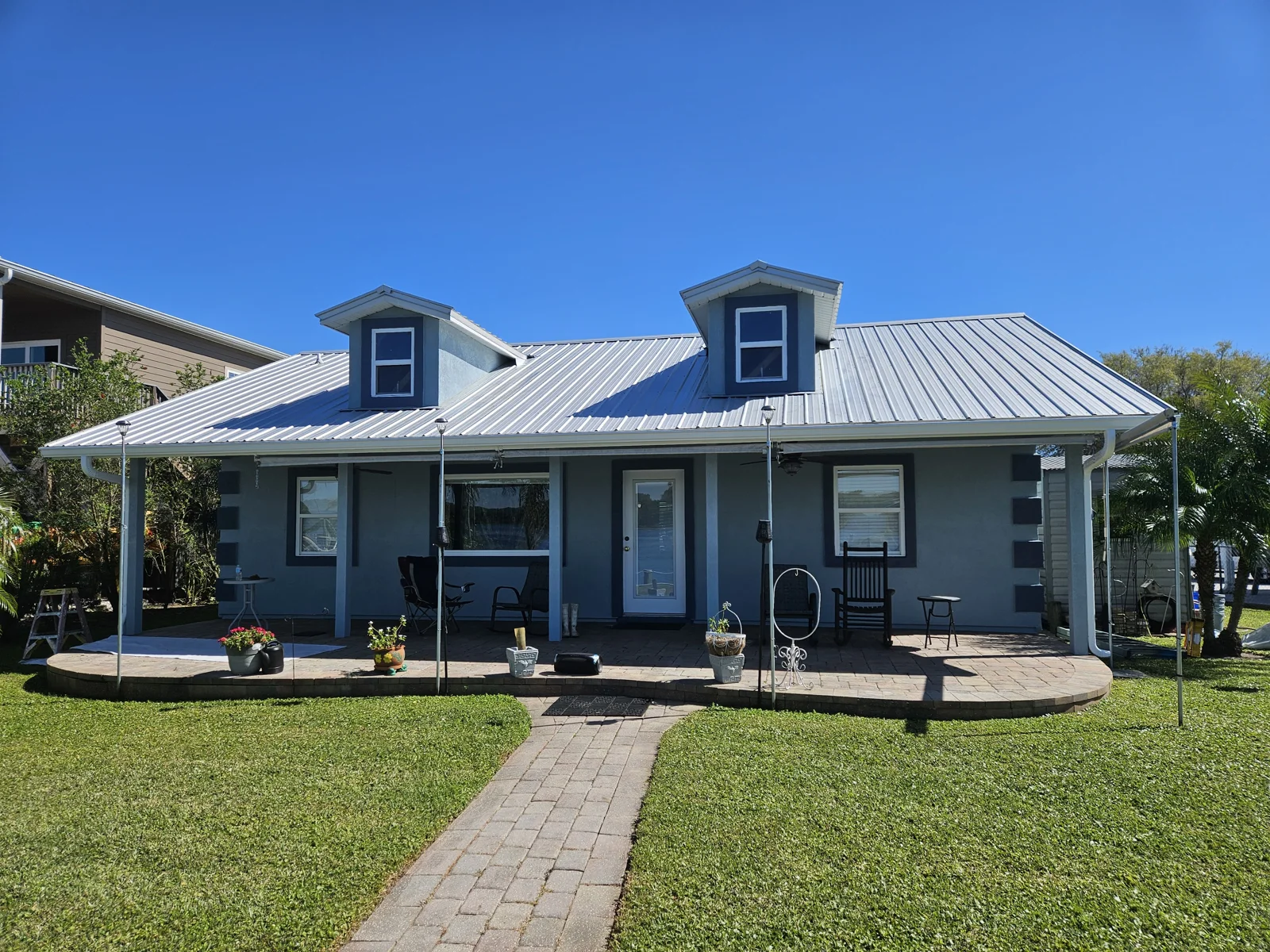 Stunning home on the St. John's River in Welaka, FL freshly pressure washed, repaired and exterior painted by T&B Paint Pros LLC. Serving Palm Coast, St. Augustine, Daytona Beach and the surrounding areas!
